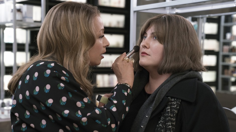 Julia (Tamara Tunie) applies makeup to Plum's (Joy Nash) face in the pilot of 'Dietland'