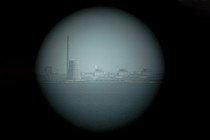 A nuclear-power plant seen through a scope