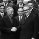 Henry Kissinger shakes hand with Le Duc Tho, leader of North Vietnam delegation, after the signing of the Paris Peace Accords on January 23, 1973.