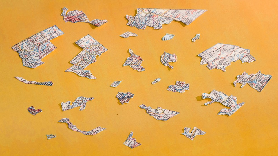 Cut up bits of a map are laid over a yellow background