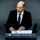 A photo of German Chancellor Olaf Scholz giving a speech