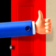 A hand making a thumbs-up through an open door