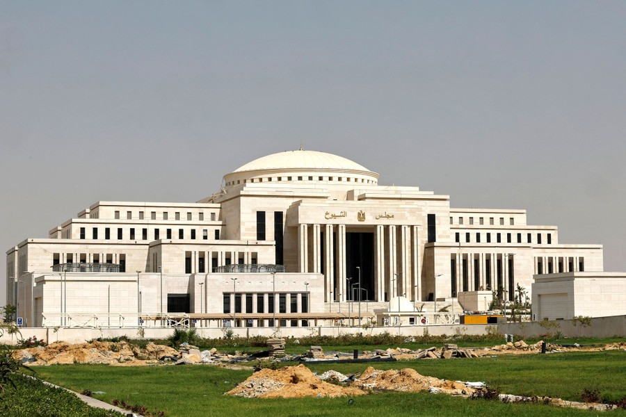 A large government building, seen under construction