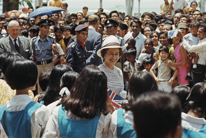 Picture of Queen Elizabeth II meeting with local children and residents of Malacca state during a Commonwealth visit by members of the British royal family to Malaysia in March 1972
