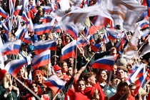 People wave Russian flags