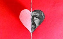 An illustration of a paper heart with Donald Trump's face filling in half of the heart icon