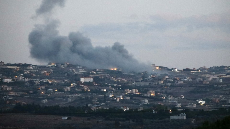 Smoke comes from the Lebanese village of Taybeh