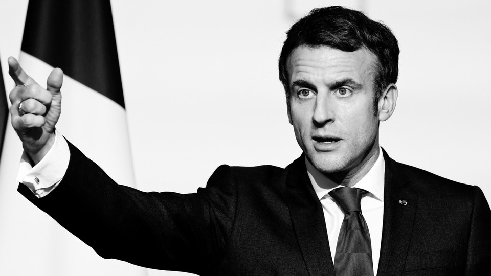 French President Emmanuel Macron gesturing
