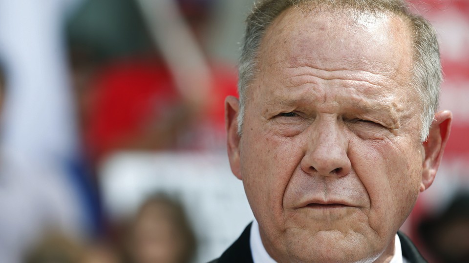Alabama Chief Justice Roy Moore speaks to the media during a news conference in Montgomery on August 8.