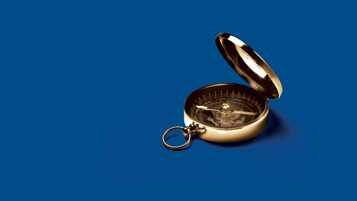 image of compass with presidential seal