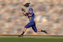 Photo of a football player about to make a catch, but the football has been altered to be a graduation cap