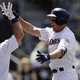 The San Diego Padres' Hunter Renfroe (right) celebrates with his teammate Austin Hedges.