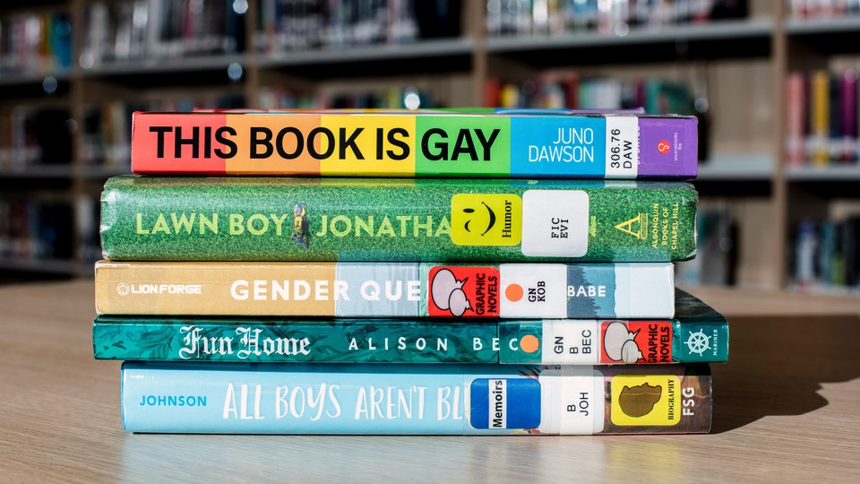 A photo of a stack of LGBTQ-themed books