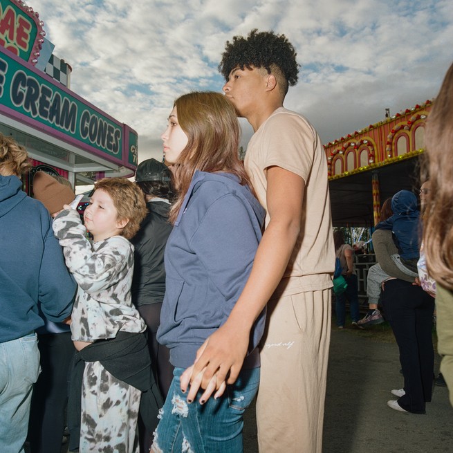 people waiting in line for fair snacks