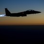 A pair of U.S. Air Force F-15E Strike Eagles fly over northern Iraq after conducting airstrikes in Syria on September 23, 2014. 
