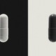 A white pill against a black background on one side of the image, a black pill against a white background on the other