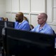 Inmates at work on computers at San Quentin