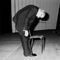 Photo of the Russian cellist Mstislav Rostropovich bowing on stage