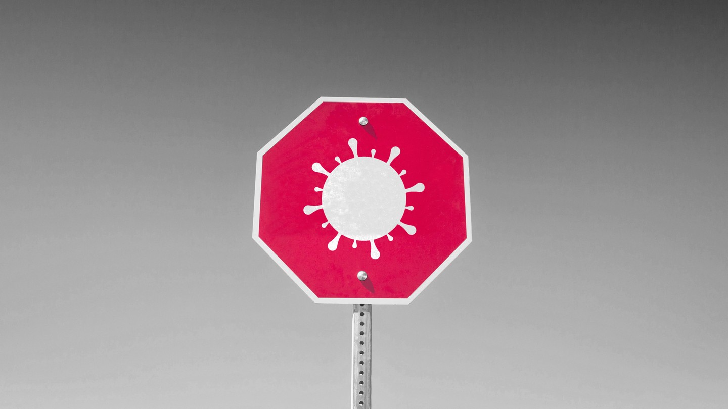A coronavirus on a red stop sign