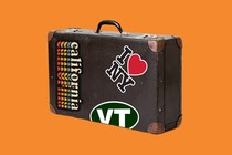 A suitcase with blue-state decals