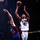 San Antonio Spurs Tim Duncan in action vs New York Knicks Chris Dudley.