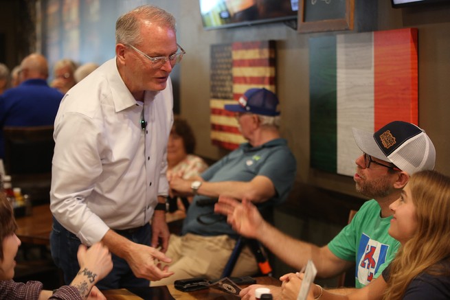 Photograph of Hamilton meeting voters