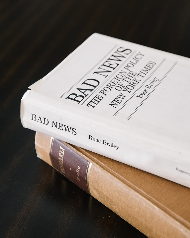 Photo of the upper spines of two books from Nixon's library, 'Bad News' and 'Disraeli,' stacked on top of each other