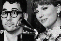 Jack Antonoff and Taylor Swift with a Grammy Award