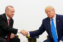 President Donald Trump and President Recep Tayyip Erdoğan shake hands.