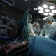 Doctors perform surgery