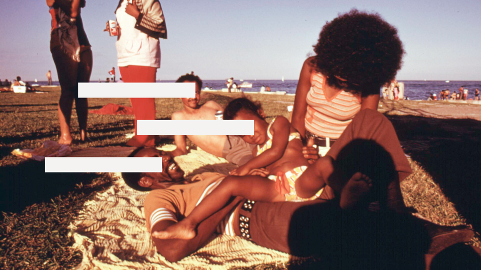 photograph of a family at the beach