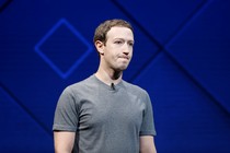 Mark Zuckerberg against a blue background