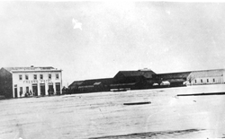 A black-and-white photograph from the 1880s shows the Fresno hotel next to the Fresno train station, the stop on the Southern Pacific Railroad around which the city would develop.