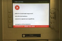 A virus-infected screen at Ukraine’s OshchadBank that says “sorry for the inconvenience/under repair” in Kiev on June 28, 2017. 