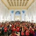 West Virginia teachers in red shirts cheer in the state Capitol after a deal was reached to end their strike. 