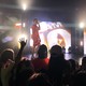 Jake Paul on stage holding a microphone