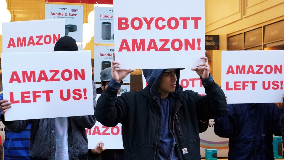 Demonstrators protest Amazon's decision not to open an office in Queens.