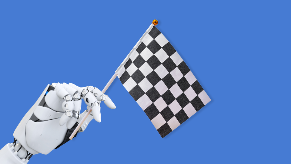 A robot hand holding a racing flag