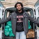 Jamel Dobbins, 31, preps and h​ands out free food at Hillside​ Elementary School, in Montclair, New Jersey.