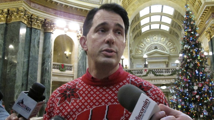 Wisconsin Governor Scott Walker speaks to reporters.