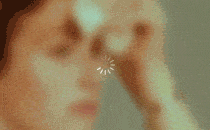 Gif of a loading circle on top of a woman's face
