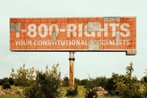 a photo illustration of a billboard for civil-rights lawyers