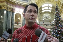 Wisconsin Governor Scott Walker speaks to reporters.