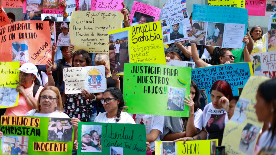 Colorful protest signs about the people deported to El Salvador