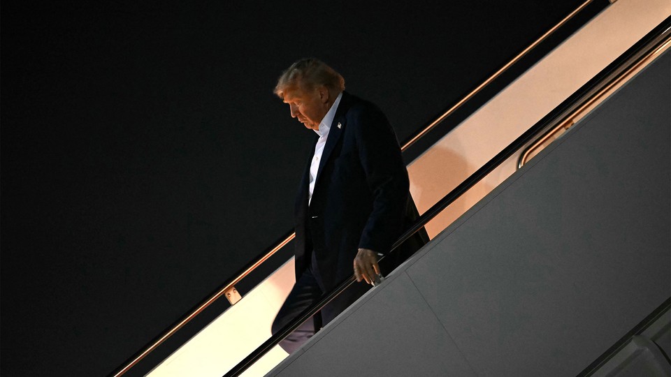 Photo of Donald Trump disembarking from Air Force One