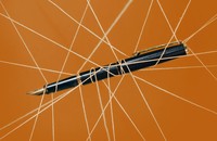 A pen being pulled by wires