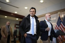 Vivek Ramaswamy smiles at the cameras as he arrives at the U.S. Capitol