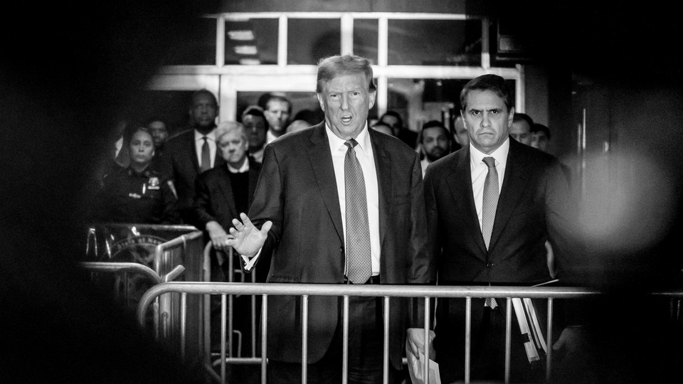 Picture of Donald Trump behind barricades