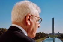 David Rubenstein's profile, with the Washington Monument in the background