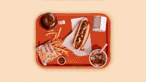 A GIF of a tray full of food that disappears